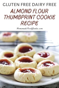 gluten free dairy - free almond floured thumbprint cookie recipe on a white plate