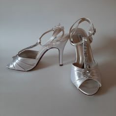 These Gorgeous White Bridal Heels Have A Rhinestone Strap With A Teardrop Accent. These Have Never Been Worn. Heel Height 10 Cm/ 4" Elegant Bedazzled Heels For Wedding, Fitted Open Toe Wedding Shoes With Rhinestones, Silver Wedding Shoes With Rhinestones For Reception, Silver Rhinestone Wedding Shoes For Reception, Formal Fitted Wedding Shoes With Rhinestones, Elegant Rhinestone Wedding Shoes For Reception, Elegant Bedazzled White Wedding Shoes, Elegant Rhinestone Wedding Shoes, Elegant Rhinestone Wedding Reception Shoes