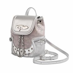 Trendy mini-backpack in silver with chain details and textured accents. Features a flap closure and adjustable shoulder straps for comfortable wear Size: 22*12*20 cm / 8.7*4.7*7.9 inMaterial: Vegan Leather Y2k Black Aesthetic, Y2k Blue Aesthetic, Dream Handbags, Y2k Backpack, Aesthetic Store, Indie Aesthetic Outfits, Egirl Clothes, Ripped Jeans Men, Y2k Men