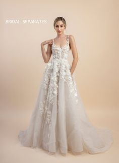 a woman in a wedding dress with flowers on it and the words bridal separates