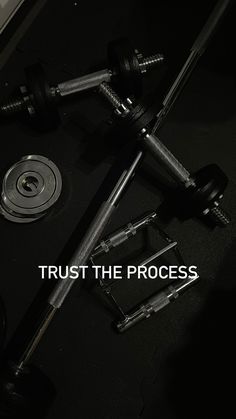 the words trust the process are shown above an image of dumbbells and weights