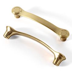 two brass handles on white background with clipping for use in interior or exterior doors