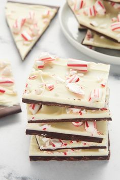 several pieces of white chocolate with candy canes on top