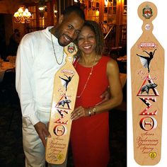 a man and woman posing with their skateboards