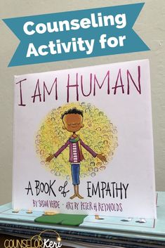 a book with the title i am human written on it