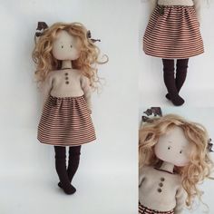 a doll with blonde hair wearing a striped dress and black boots, standing next to a white wall