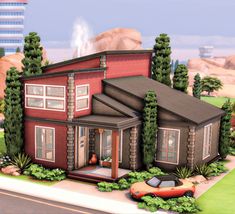 a red car is parked in front of a two story house with trees and bushes