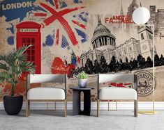 two chairs and a table in front of a wall with british flag images on it