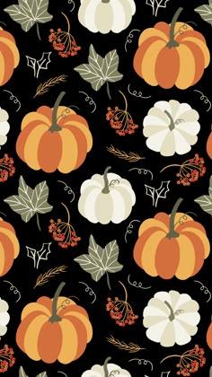 a black background with orange and white pumpkins