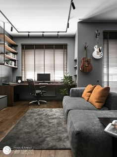 a living room filled with furniture and a guitar hanging on the wall next to a window