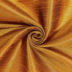 a close up shot of an orange fabric