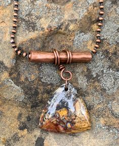 This brown and gray agate hangs from a hammered copper setting with a black leather cord and copper clasp. Approximately 21" long. Focal piece is 2" long and 1" wide. The Copper Components have been antiqued, polished and sealed. Sealed with Protectaclear. ProtectaClear is a clear, protective coating that is tough enou Copper Jewelry Tutorial, Bails For Jewelry, Earthy Earrings, Washer Jewelry, Copper Tube, Copper Jewelry Handmade, Mixed Media Jewelry, Garden Quartz, Wire Work Jewelry