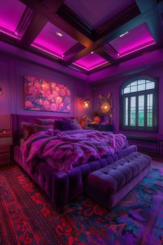 a large bed sitting in the middle of a purple room