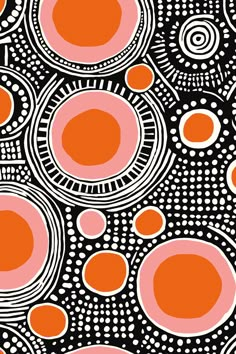 an orange and black background with circles