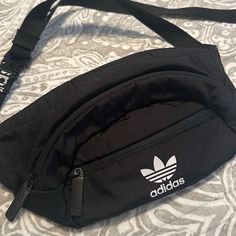 Practically Brand New. Trendy Streetwear Pouch Bag, Trendy Black Bags For Streetwear, Trendy Black Streetwear Bags, Black Bags With Pockets For Streetwear, Casual Pouch Bag For Streetwear, Black Streetwear Bags With Pockets, Casual Streetwear Pouch Bag, Trendy Adidas Shoulder Bag With Adjustable Strap, Casual Adidas Bag With Zipper Closure