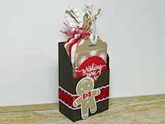 a small gift bag with a gingerbread on it