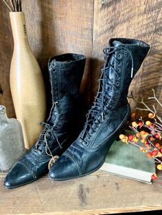 Channel your inner Sanderson sister with these witchy wonderful authentic vintage boots! Made for very tiny, narrow feet. Will make for great spooky Halloween decor or wherever you need a haunting, Halloween macabre touch! ABOUT ANTIQUES & FOUND GOODS: These one-of-a-kind items are genuine found objects and subject to some "added character" from over time, including but not limited to: slight defects, discoloration, and/or other visible imperfections. They are priced and sold “as is". For questi Witchy Boots, Antique Bouquet, Spring Arrangements, Sanderson Sisters, Flower Bar, Spooky Halloween Decorations, Black Boots Women, Vintage Boots, Derby Hats