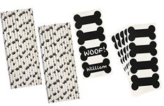 four pieces of paper with black and white bones on the front, one has a sticker that says woof