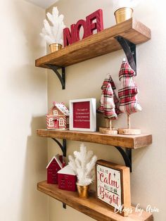 some shelves with christmas decorations on them