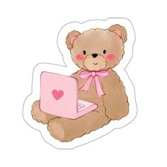 a teddy bear sitting on the ground with a laptop in its lap and wearing a pink bow