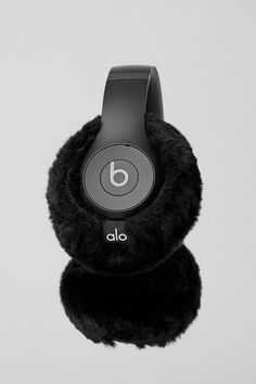 Keep an ear to the streets in the Beats Studio Pro. These noise-canceling headphones deliver powerful, immersive sound and a comfortable, cushiony feel for extended wear from everyday office and gym duties to on-the-go adventures and air travel. They have wireless Bluetooth functionality and up to 40 hours of battery life. Plus, each purchase comes with a pair of Alo Earmuffs: The cutest winter accessory for studio-to-street style—because even your tech needs an extra layer.​ Receive a pair of E Bowers And Wilkins Headphones, Headphones Black, Cute Headphones, Beats Studio, Black Headphones, Girly Phone Cases, Pretty Shoes Sneakers, Alo Yoga, Back Women