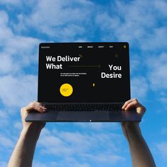 someone holding up a laptop with the words we deliver what you desired