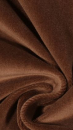 a close up view of a brown fabric