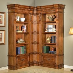 a large wooden bookcase with many books on it