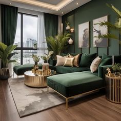 a living room with green couches and gold accents