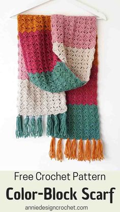 a crochet scarf hanging on a wall with text overlay that reads free crochet pattern color block scarf