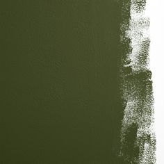 the wall is painted green with white paint