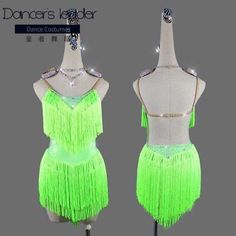 the dance costume is green and has fringes on it