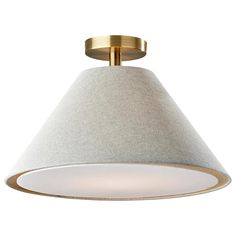 a light fixture with a white shade on the top and a gold metal ring around it