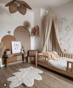 a bedroom with a canopy bed and rugs on the floor, walls and ceiling