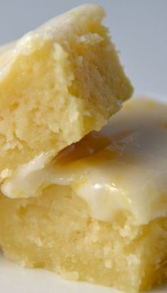 two pieces of cake sitting on top of a white plate