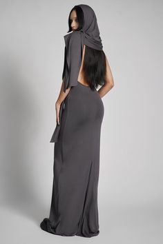 Make them take a second glance. Maxi dress made from luxuriously dense Jersey, featuring an add-on hood that can be draped across the shoulders and over the crown of the head, with plunging halter top neckline. FIT NOTES:Tatianna wears a size Small, 5'9, with a 26" waist. MATERIALS:95% rayon 5% spandexMade in China Dresses With Hoods, Top Neckline, Hooded Dress, The Crown, Halter Top, Dress Making, Take That, Crown, Ships