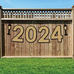 a wooden fence with the numbers 2012 on it