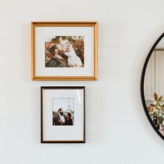 three framed photos hang on the wall next to a mirror