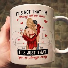 a person holding a coffee mug with the words it's not that i'm sorry all the time