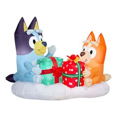 two inflatable animals with presents on an inflatable raft, one holding a gift box