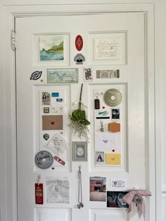 a white door covered in pictures and magnets