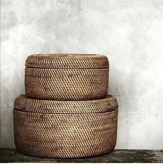 three woven baskets stacked on top of each other