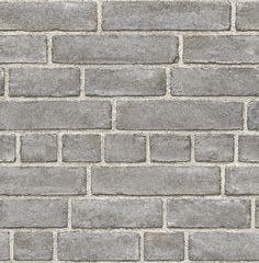 a gray brick wall textured with cement