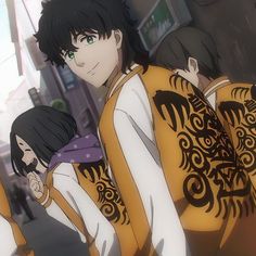 an anime character with black hair and green eyes standing in front of other characters wearing yellow vests