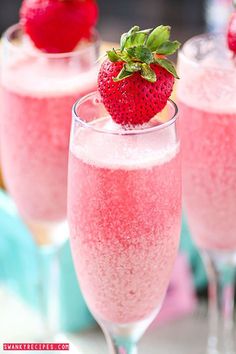 three glasses filled with pink liquid and topped with a strawberry on the top that says thriling thursday 15 % discount on beverages