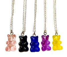 four different colors of gummy bear necklaces