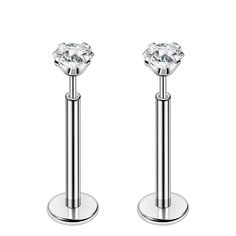 pair of stainless steel barbells with clear crystal stones on each end, isolated against a white background