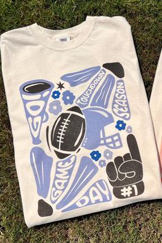 Get this popular NEW blue and black touchdown season shirt and show off your team spirit in style!  Each shirt is printed in-house by me using high-quality materials on a Comfort Colors shirt, known for its exceptional comfort, style, and durability. Available in unisex sizes S to 3X, and youth sizes, we've got you covered regardless of your preferred fit. This football game day shirt features a classic crew neck and short sleeves, making it suitable for year-round wear. The flattering silhouett Fitted T-shirt For Team Spirit, Affordable Team Spirit Screen Print Tops, Simple School Spirit Shirts, Cheap Pre-shrunk School Spirit Shirt, Game Day Graphic Tee, School Sports Shirts Design, Cute Football Shirts Ideas, College Cheer Shirts, High School T Shirts