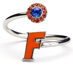 PRICES MAY VARY. Stone Armory's University of Florida ring is finally here! Gear up for the game with our beautifully designed Florida Gators ring. Wear it to the next tailgate or around town to show off your University of Florida pride. This adjustable Florida ring would also make the perfect Florida gift for your favorite Gators fan! The Florida logo is accented by sparkling orange and blue crystals for a fashionable fan look. Stone Armory's Florida ring is made of stainless steel and adjustab Florida Jewelry, University Rings, Uf Gators, Orange Crystals, University Of Florida, Florida Gators, Crystal Charm, Charm Set, Photo Bracelet