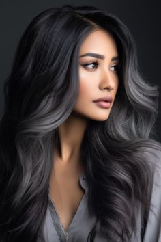 For those who prefer a monochrome appearance, try ashy charcoal highlights on jet-black hair. These toned highlights provide a subtle yet edgy contrast against the dark base, ideal for those who desire a sleek and contemporary look. Click here to check out more gorgeous hair highlight ideas for every base shade.